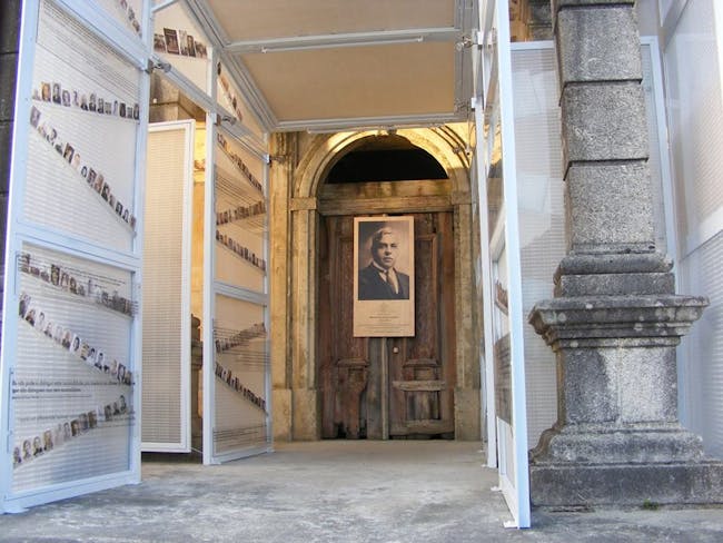 The walls of the exhibit show photos of the individuals Aristides saved during WWII.