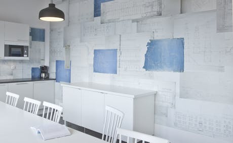 Wall design. Collage of old architectural drawings for office in Stockholm