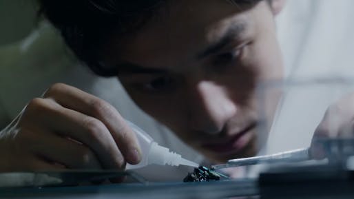 A young surgeon attempts to assemble a model of a bug in under 15 minutes. Screenshot: YouTube.