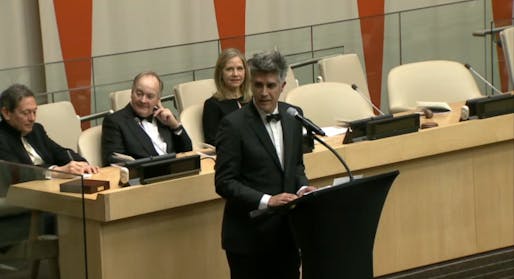 Alejandro Aravena accepts the Pritzker Prize during a ceremony at the United Nations in New York City.