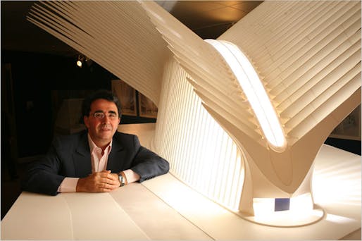 The architect with a model for his WTC transportation hub, currently costing nearly $4 billion. (Image via forum.skyscraperpage.com)