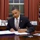 President Obama signing a bill, via wikimedia.org