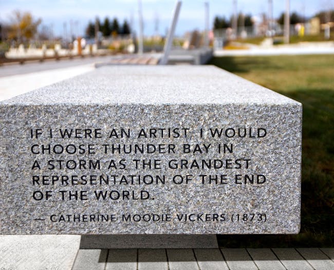 Poetry etched in granite seating bench