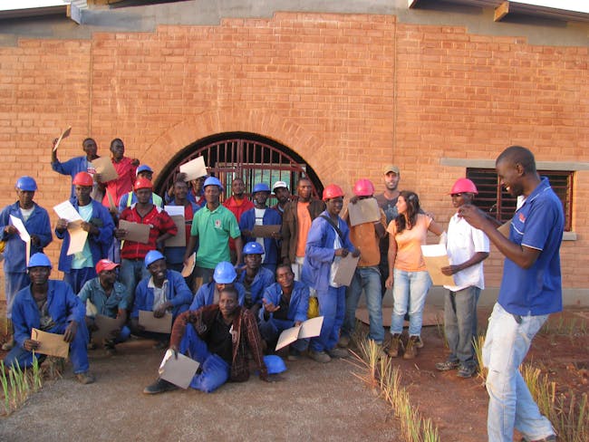 Workers at the Manica Football for Hope Center receiving their training certificates. Location: Manica, Mozambique. Credit: Paulo Carneiro
