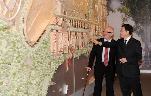Chief Secretary and West Kowloon Cultural District Authority Board Chairman Stephen Lam (right) and the authority’s CEO Michael Lynch on October 3, 2011 inspecting the cultural district project's development plan. (Photo courtesy of Hong Kong Information Services Department)