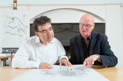Professor Tom Inns (left) and Professor George Cairns (right) look at some of the special drawings donated to the GSA. Photo: Alan McAteer.