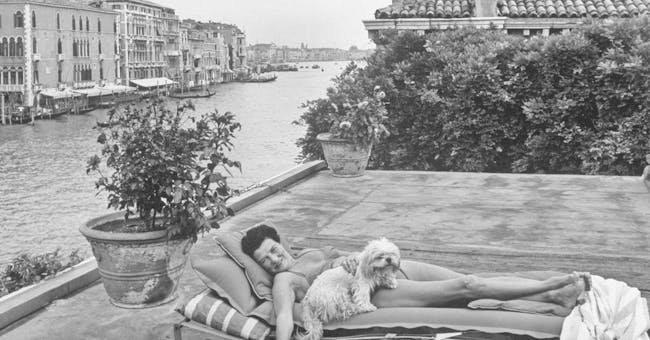 Peggy Guggenheim on the roof of Ca’ Nonfinito, “the unfinished house,” overlooking the Grand Canal. Credit Frank Scherschel/The LIFE Picture Collection, via Getty Images
