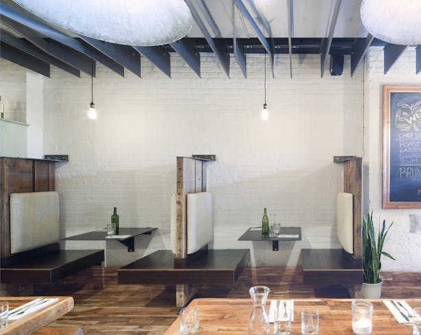 MOOBURGER - Booths featuring reclaimed timber backs & patinaed steel plate tables