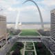 The project site in current state, with the I-70 dividing the Arch grounds and the rest of Downtown St. Louis. Photo courtesy of CityArchRiver via theatlanticcities.