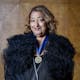 Zaha Hadid proudly wearing the Royal Gold Medal. Photo: Sophie Mutevelian.