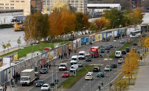 A 1.3-kilometer (0.8-mile) stretch of the Berlin Wall, the world's longest open-air art gallery, was decorated by 118 artists from 21 countries in 1990. (image via spiegel.de)
