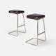 Ludwig Mies van der Rohe and Philip Johnson custom Four Seasons bar stools. Image via wright20.com