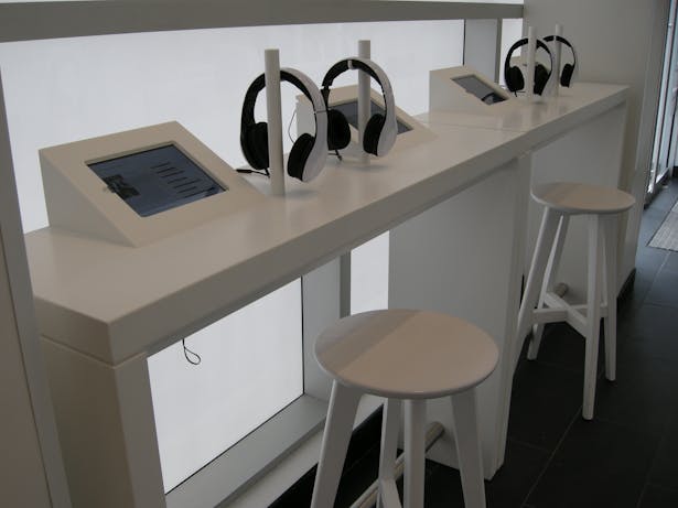 custom solid surface listening bars with integrated iPad holders