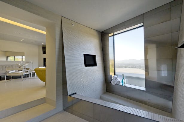View of integrated master bathroom tub (photo: Imeh Akpanudosen)