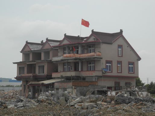 A house in Hongqiao resists demolition. Photo: Wade Shepard, via City Metric.