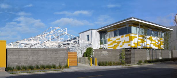 Day view from 7th Street; reclaimed steel and rehabilitation visible on left.
