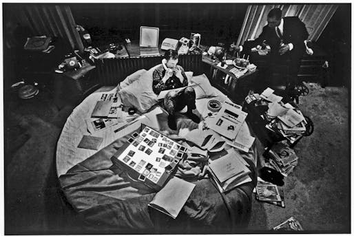 Hugh Hefner at the helm of his media empire: the bed. Image via averyreview.com.