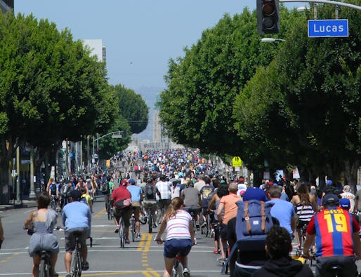 CicLAvia is an event series that blocks off car-access on certain streets in LA so that they can be used by bicyclists and pedestrians instead. Credit: Wikipedia