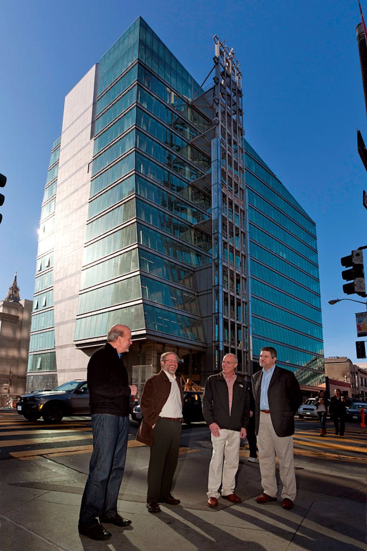 Team photo from left to right David Hobstetter, Principal, KMD Architects; Michael Rossetto, Sr Associate, KMD; Kelly Galloway, Director of Construction Administration, KMD; and Matt Rossie project manager for Webcor Construction, standing in front of 525 Golden Gate (Photo: Michael O'Callahan)