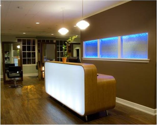 Once inside the clients are greeted with a custom designed reception desk.