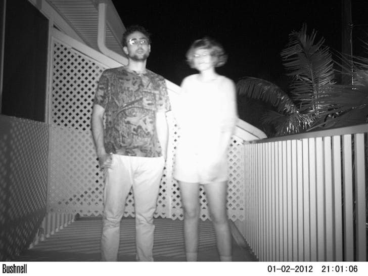 Ian Quate and Colleen Tuite of GRNASFCK, an experimental landscape studio, as captured by a trailcam. Credit: GRNASFCK
