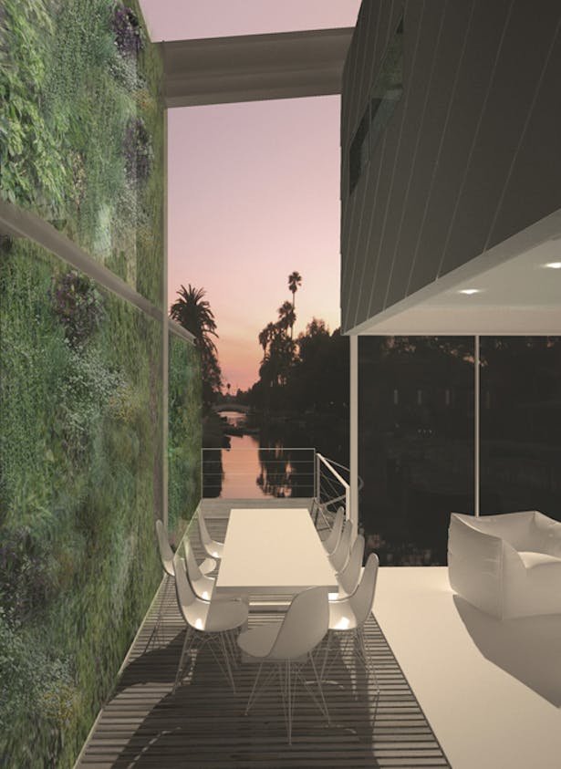 Breezeway / patio with open NanaWall system, facing canal at sunset